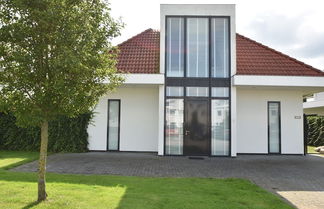 Photo 1 - Holiday Home in Zeewolde With Jetty Next to Golf Course