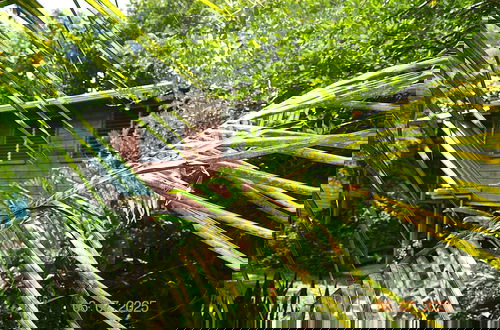 Photo 20 - Family Treehouse Retreat Cozy Cabin in Tropical Gardens, Minutes From Ruins