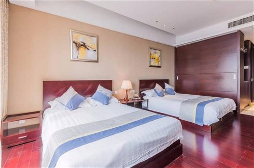 Foto 11 - No.7 Apartment Hotel Xingguang