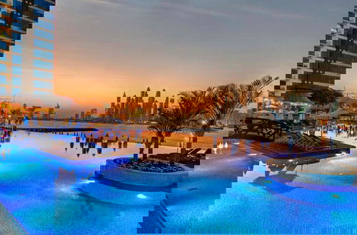 Foto 3 - Stunning 3BR at the Palm w Beach Access