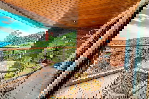 Foto 48 - Vista para Oceano e Ar condicionado