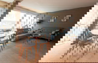 Foto 1 - Apartment With Side sea View