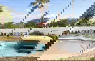 Foto 3 - 7bdr w/ Private Pool, Hot Tub, Fire Pit, Walk to Beach Tidal Wave by Avantstay