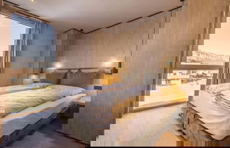 Foto 3 - Appartamento con 3 camere da letto a Oberndorf in Tirol con giardino e sauna