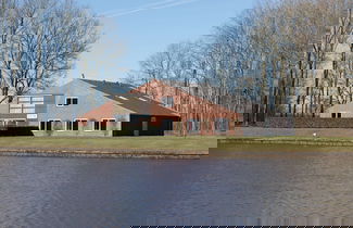 Photo 1 - Well Furnished Home for Groups with Fireplace near Water