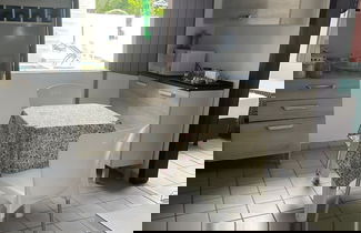 Foto 1 - Quarto na praia com cama de casal