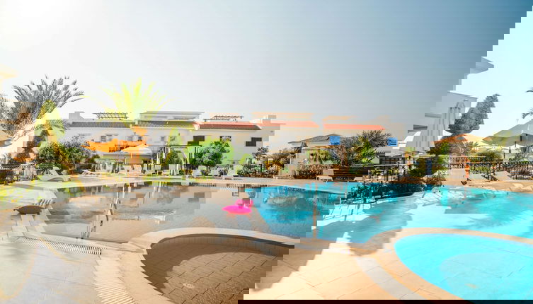 Photo 1 - Sunny and Family Friendly Apartment Directly at the Pool