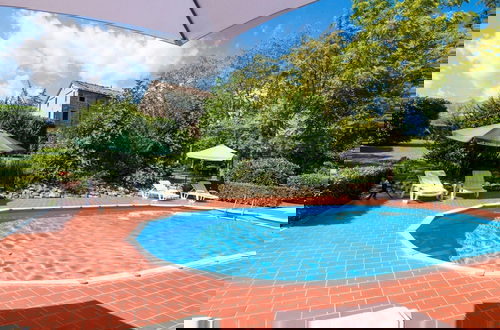 Foto 25 - Spacious Holiday Home With Swimming Pool