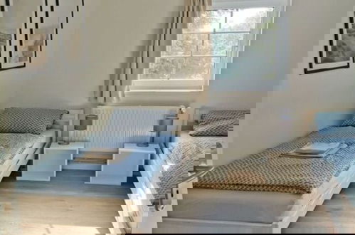 Foto 6 - Inviting Apartment Near Lake