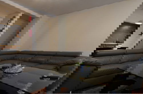 Foto 9 - Swanky Apartment