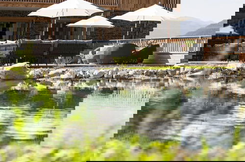 Foto 4 - Nice Chalet in Wolting With Natural Swimming Pond