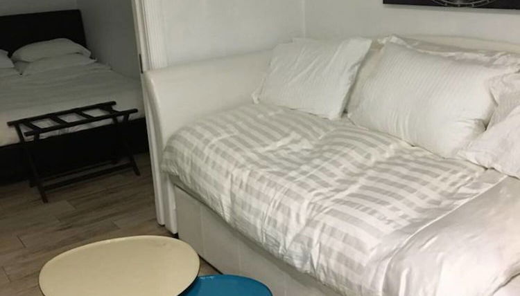 Foto 1 - Best Deal 2BR Modern Beachfront Ocean Drive Wifi