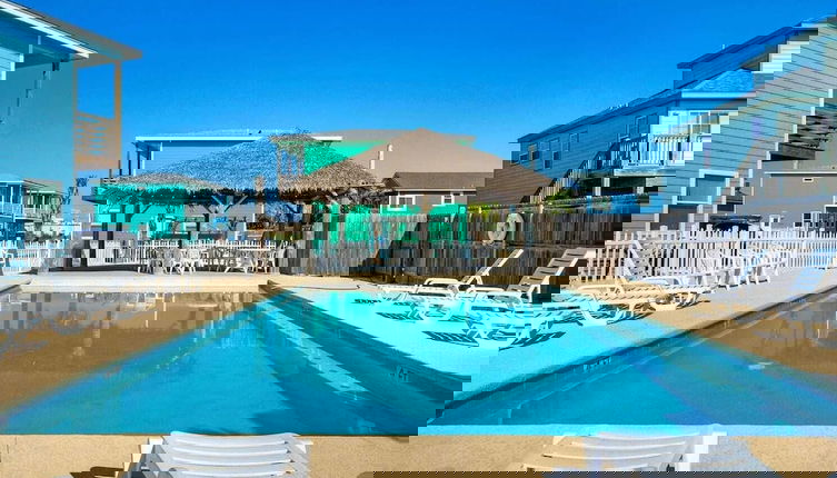 Photo 1 - Pool Cabana, Backyard w/ Fire Pit, Walk to the Beach Villa Reel by Avantstay