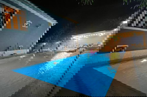 Photo 8 - Cozy House With Swimming Pool Near City Center