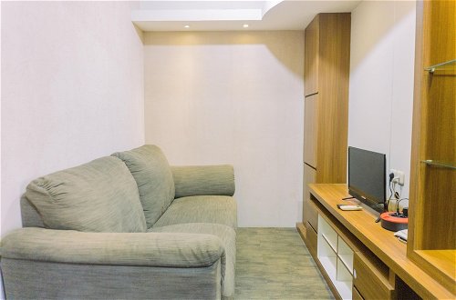 Photo 10 - Cozy Stay And Tidy 1Br Green Bay Pluit Apartment