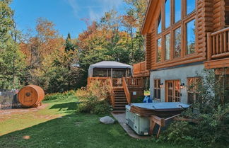 Photo 1 - Grand Duc 74 - Gorgeous log Cottage With Private hot tub Heated Pool and Sauna