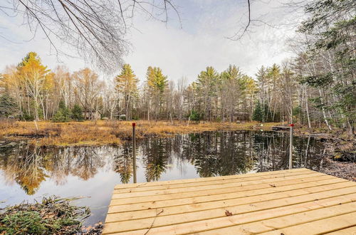 Photo 23 - Lake Nelson Home w/ Dock & Fire Pit