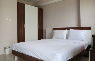 Foto 3 - Cozy Stay Studio At 27Th Floor Daan Mogot City Apartment