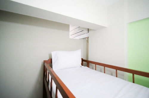 Photo 3 - Homey And Comfy 2Br At Dian Regency Apartment