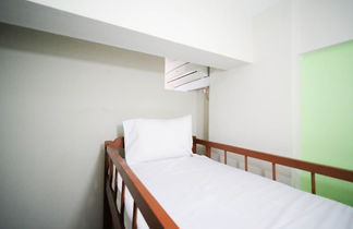 Photo 3 - Homey And Comfy 2Br At Dian Regency Apartment