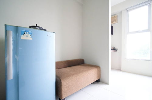 Photo 12 - Homey And Comfy 2Br At Dian Regency Apartment