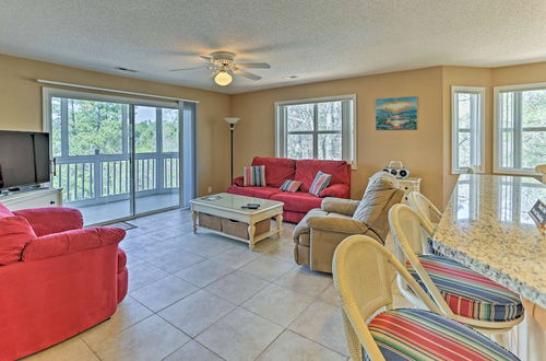 Photo 1 - Southport Resort Condo w/ Pool + Beach Access