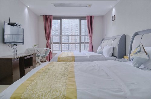 Foto 6 - Guangzhou Uhome International Apartment