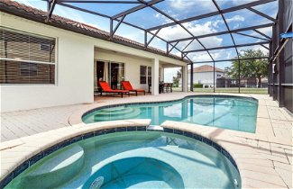 Photo 3 - Grand 5BR Villa Private Pool SPA 2 Miles to Disney