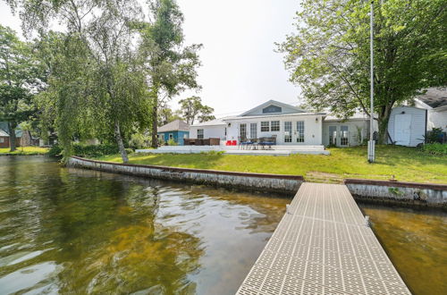 Photo 12 - Lakefront Gladwin Vacation Rental w/ Deck & Dock