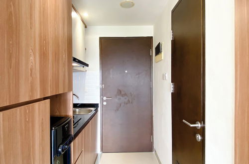 Photo 11 - Minimalist And Homey Studio Apartment At Mustika Golf Residence