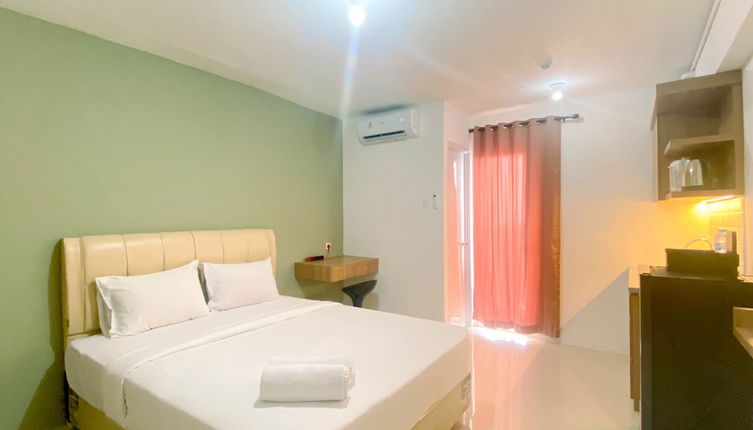 Photo 1 - Comfy And Strategic Studio Apartment At Bassura City