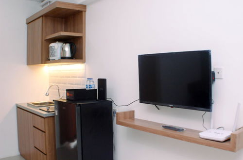 Photo 9 - Comfy And Strategic Studio Apartment At Bassura City
