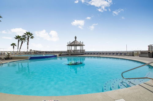 Photo 2 - Beachfront Condo on White Sands Multiple Pools