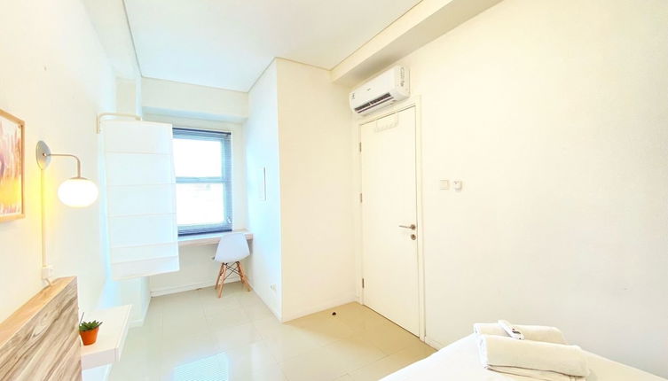 Photo 1 - Cheerful And Homey 2Br Apartment At Parahyangan Residence