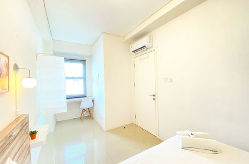 Photo 1 - Cheerful And Homey 2Br Apartment At Parahyangan Residence