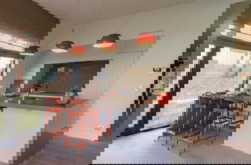 Foto 10 - Cozy Beach Apartment With Garden