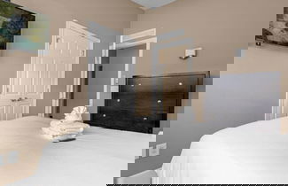 Foto 3 - Enchanted Garden Resort