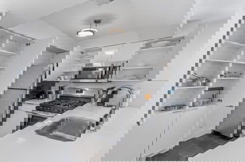 Foto 14 - Crescent Furnished Apartments v2