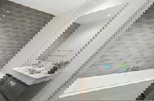 Foto 9 - Modern 2-storey Apartment - Q Stay