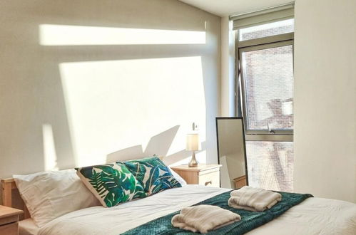 Foto 16 - Modern Aesthetic Cozy Apartment