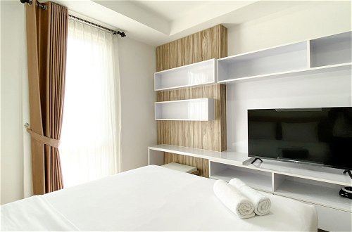 Photo 1 - Homey And Compact Studio At Azalea Suites Apartment