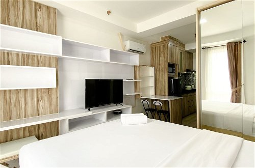 Photo 4 - Homey And Compact Studio At Azalea Suites Apartment