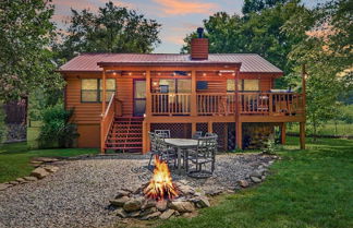 Photo 1 - Riverfront Cabin w/ Hot Tub & Mountain Views