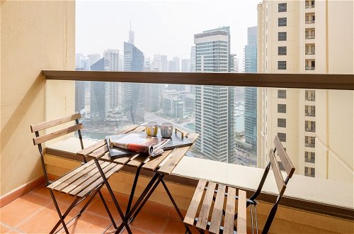 Photo 6 - Radiant & Alluring 1BR Apartment W/ Marina Views