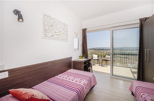 Photo 3 - Summer Breeze Penthouse with large Terrace and Hot Tub by Getaways Malta
