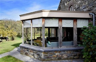 Foto 1 - Rustic House With Sunroom