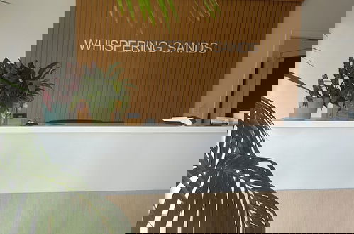Foto 2 - Whispering Sands Motel