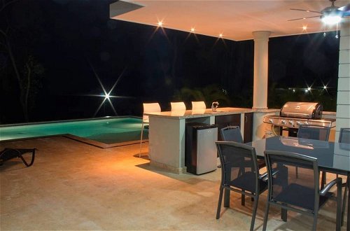 Photo 14 - Stylish 3 Bedroom w/ Covered BBQ Area by the Pool