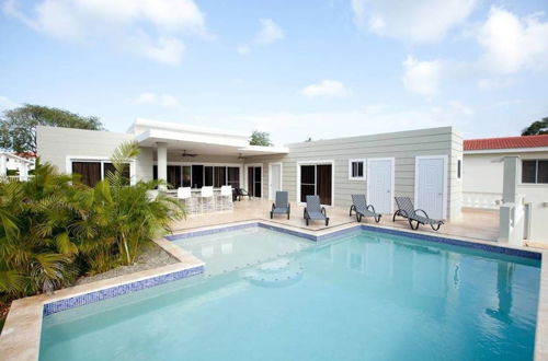 Photo 13 - Stylish 3 Bedroom w/ Covered BBQ Area by the Pool