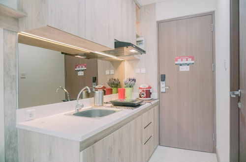 Photo 9 - Good Choice And Homey Studio Apartment At B Residence